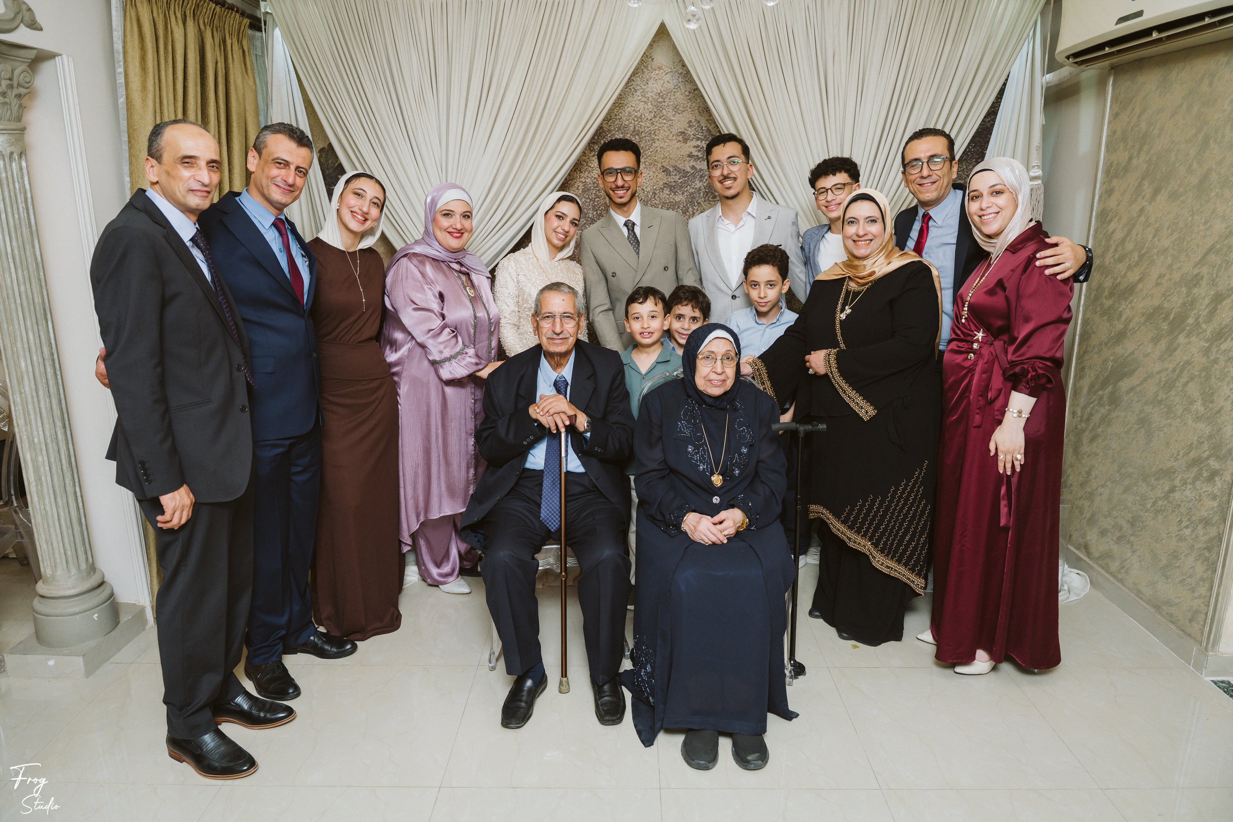 Both families together with Mohamed and Reem and the grandparents seated at the front