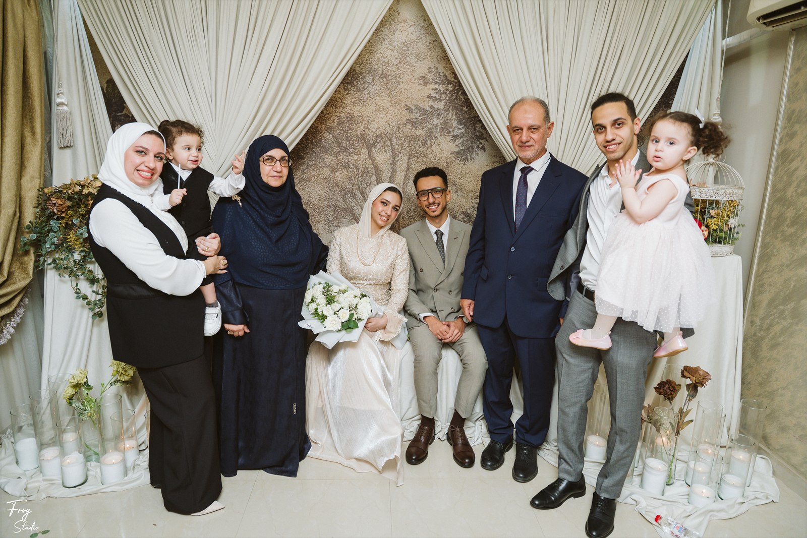 Reem and Mohamed with family members at the engagement party