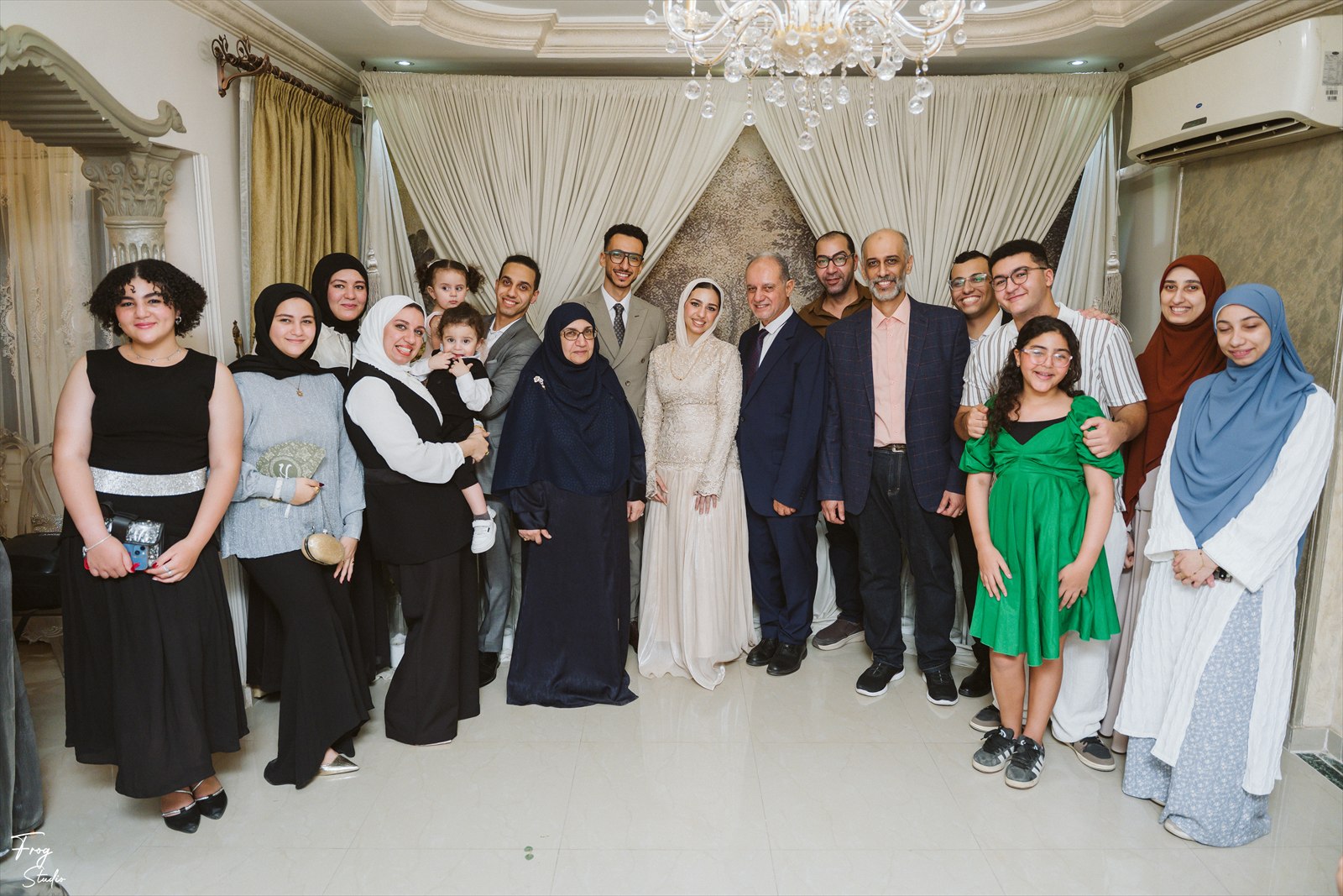 The whole family gathered for a group photograph around Reem and Mohamed
