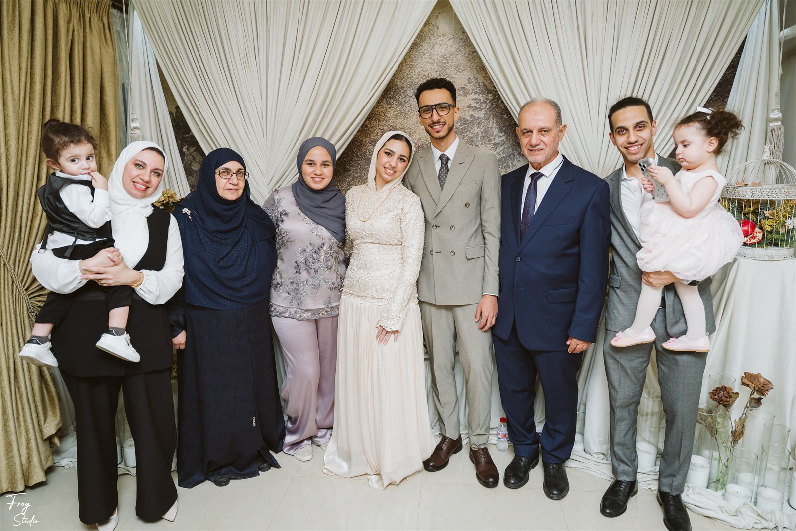 Reem&rsquo;s family gathered together around Reem and Mohamed