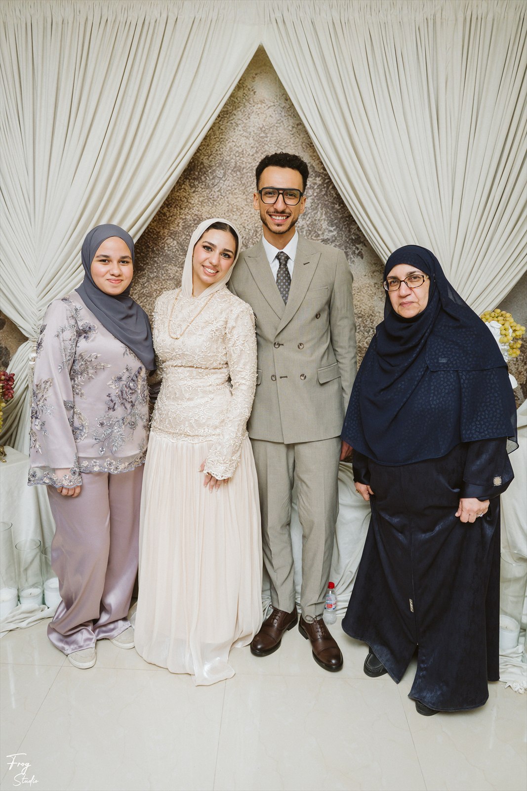 Reem and Mohamed photographed with family at the celebration